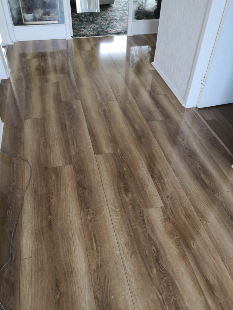Canadia Prestige Rustic Oak Gloss Laminate Flooring - The Carpet Shop Southport
