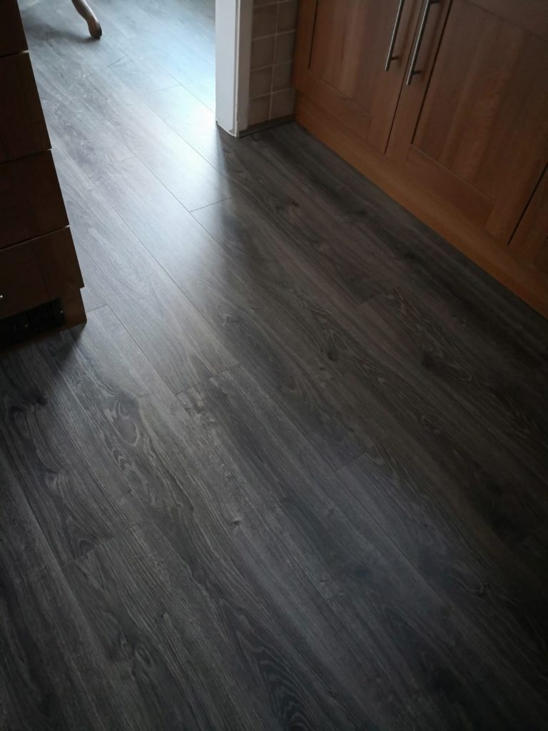 EGGER PRO Dark Lasken Oak Laminate Flooring | The Carpet Shop | Southport