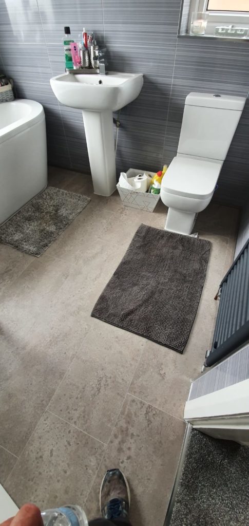 EGGER PRO Aqua Plus Grey Karnak Granite Kingsize 8mm Laminate Flooring | The Carpet Shop Southport